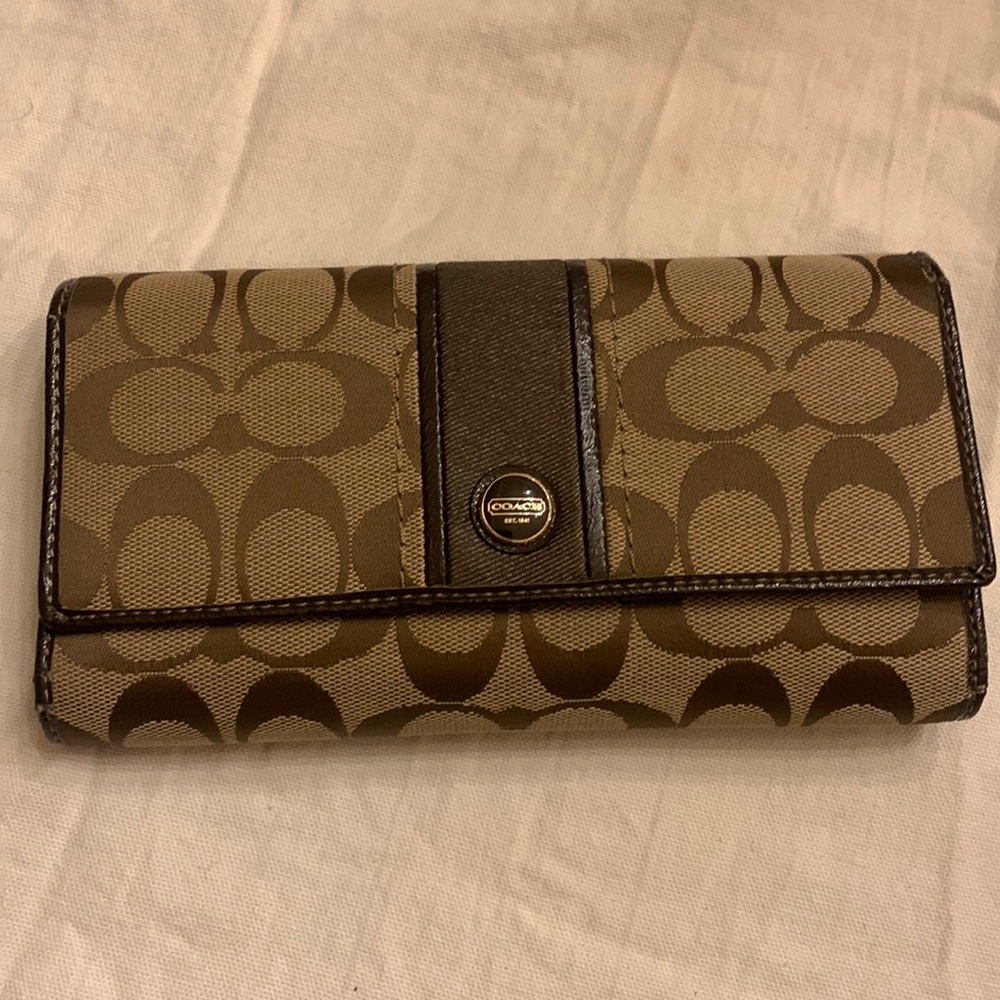 Coach monogram wallet with brown patent leather trim
